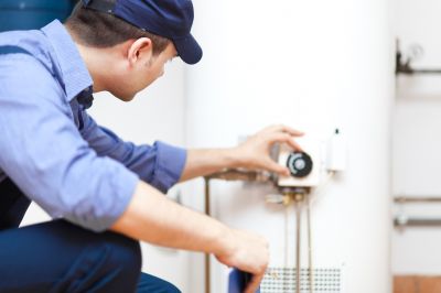 Plumber Installing a Water Heater
